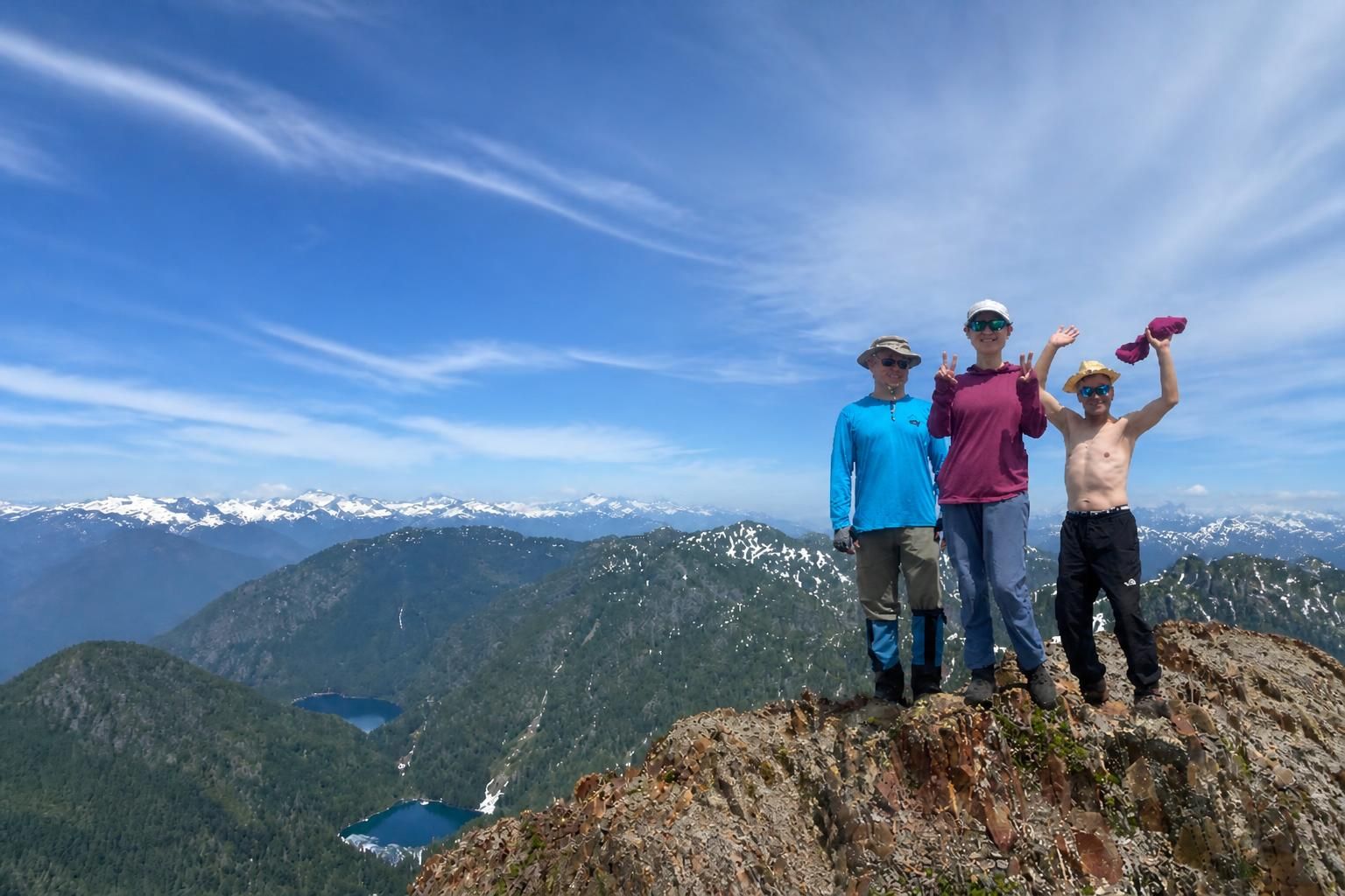 Victor, Helen, and Patrick posing together on the peak
