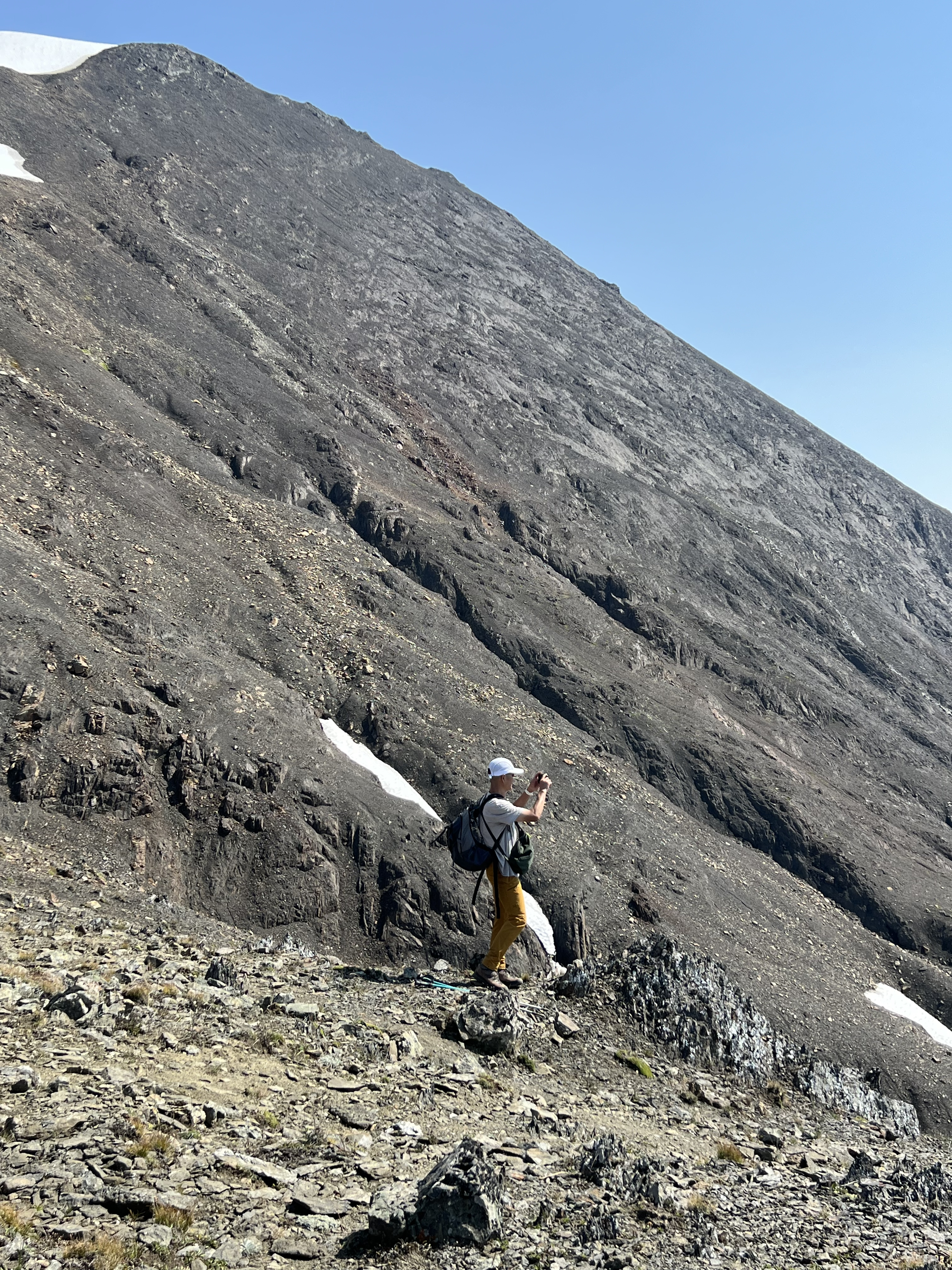 Patrick surrounded by mountains
