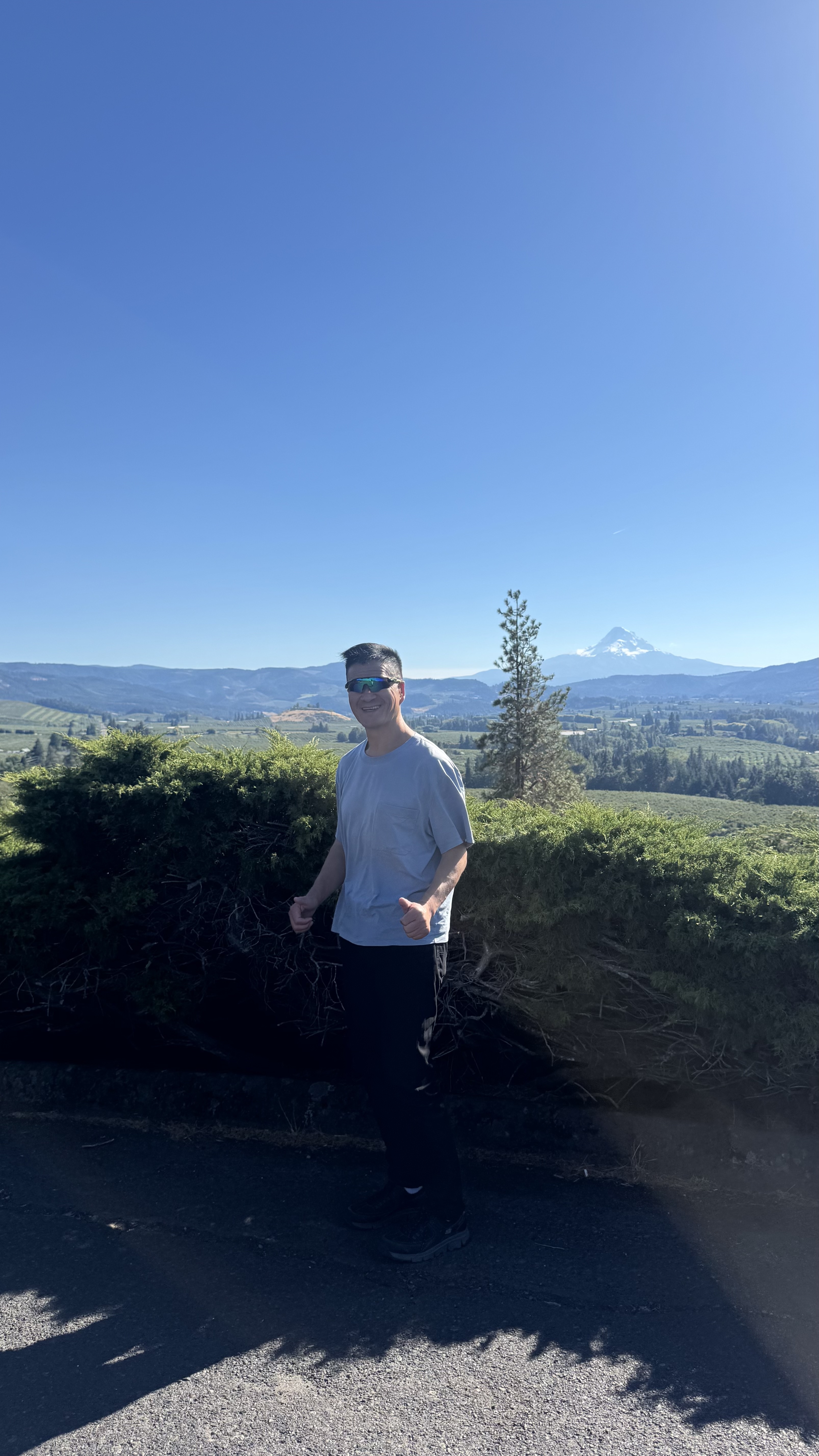 Patrick at foreground with Mt Hood in the background, at Panorama Point County Park in Hood River