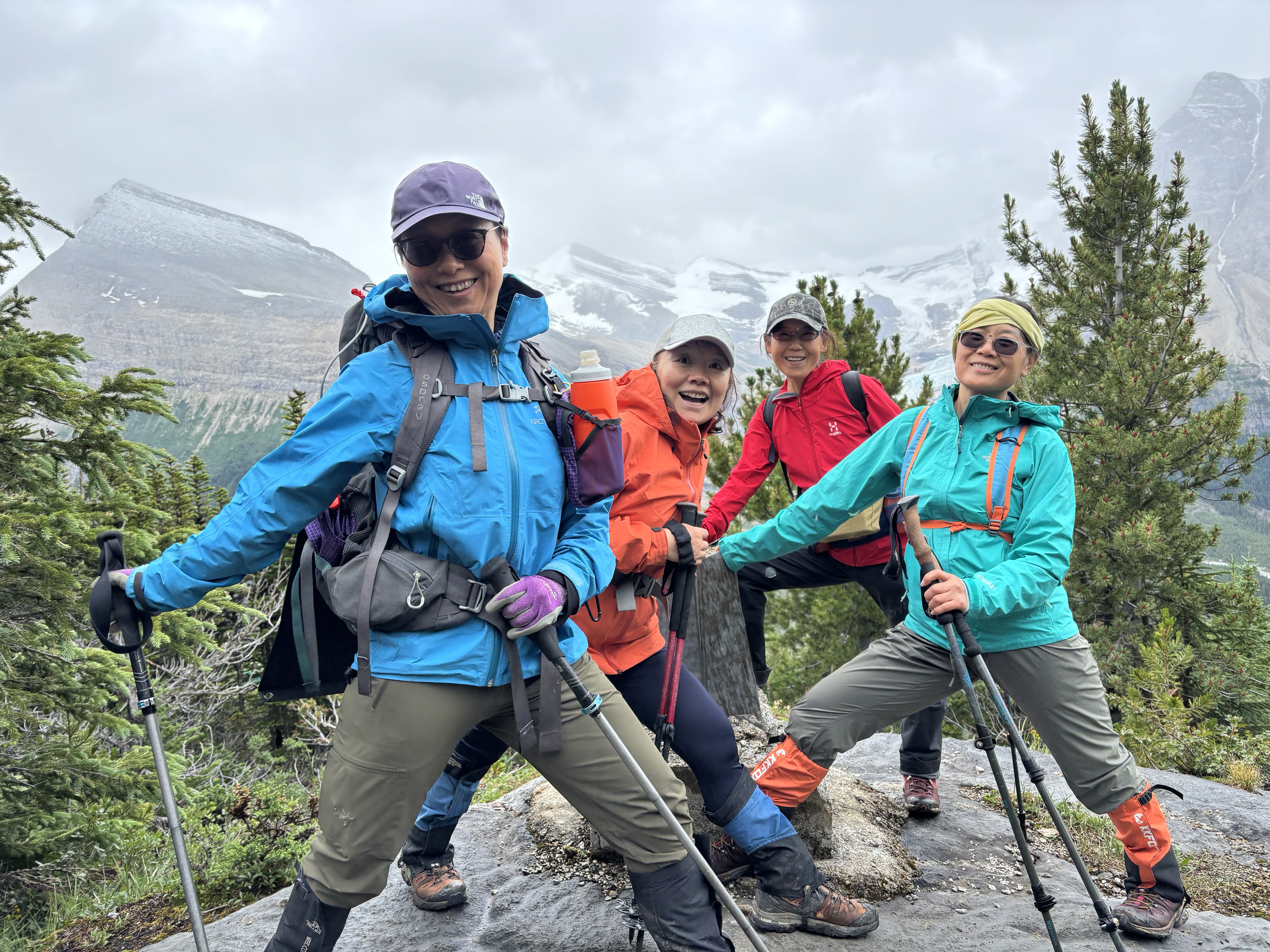 Group photo (4 ladies) at the BC/AB boundary mark