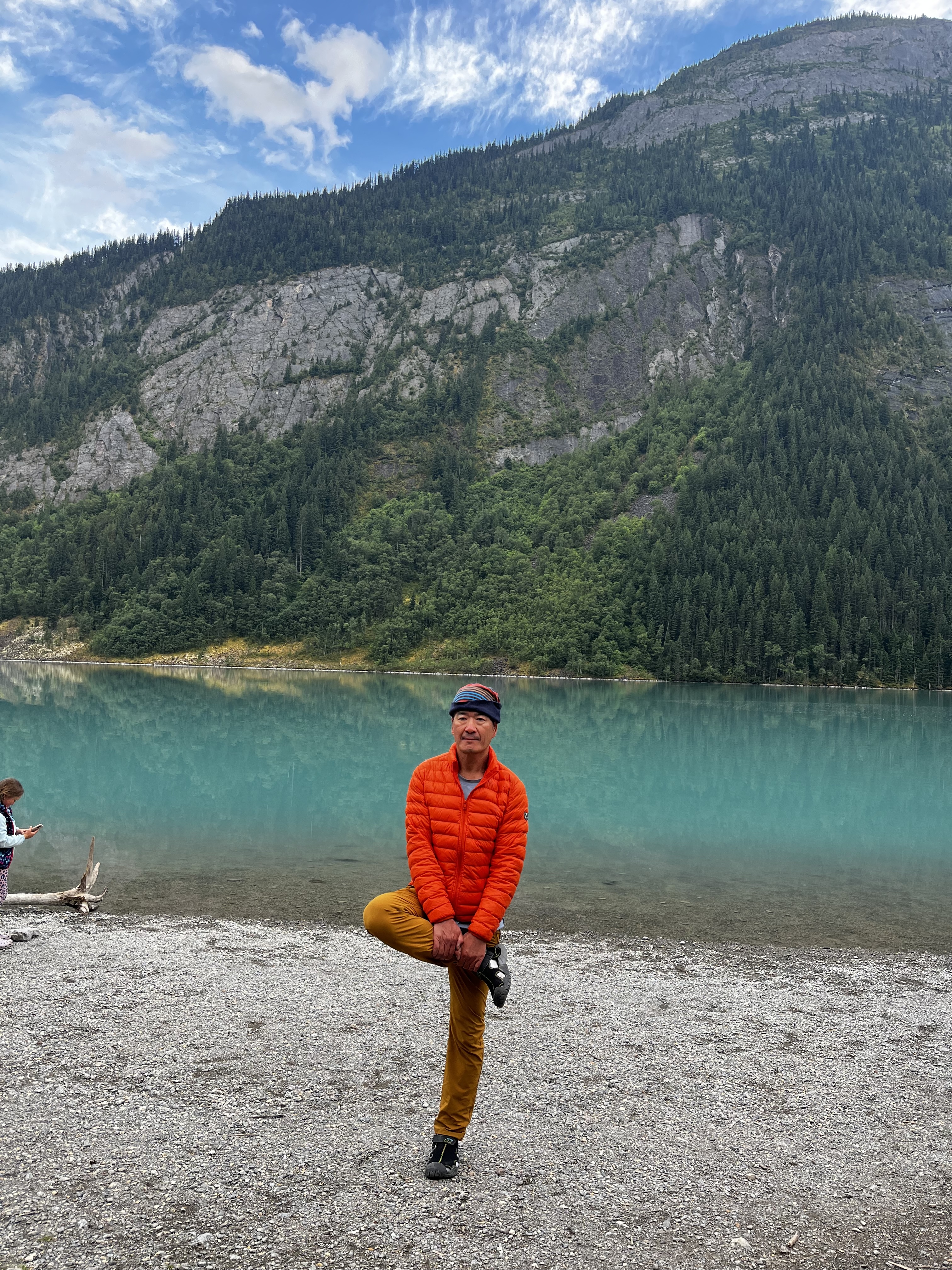 Patrick stretching at Kinney Lake beach after dinner